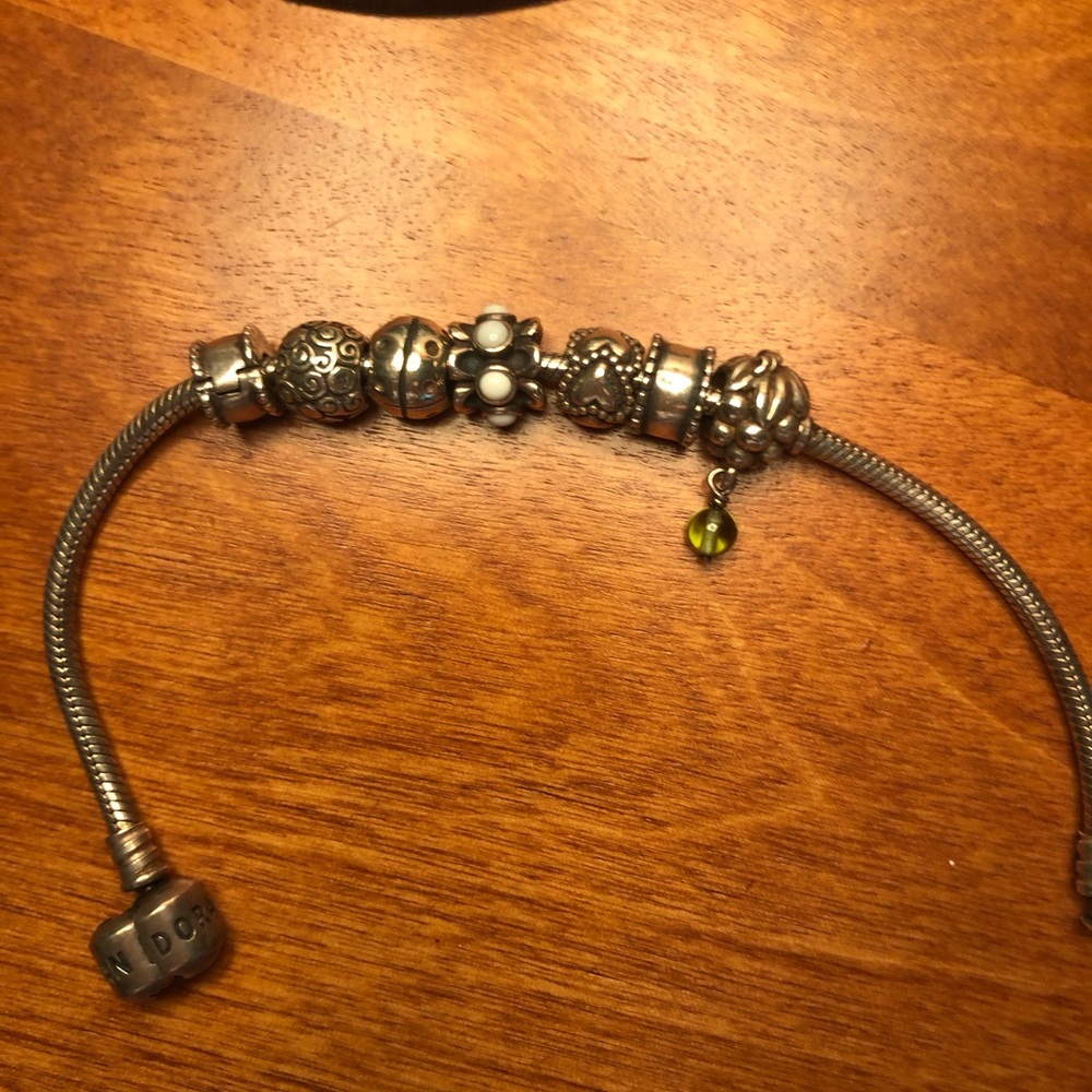 Pandora bracelet with 5 charms, hardly worn